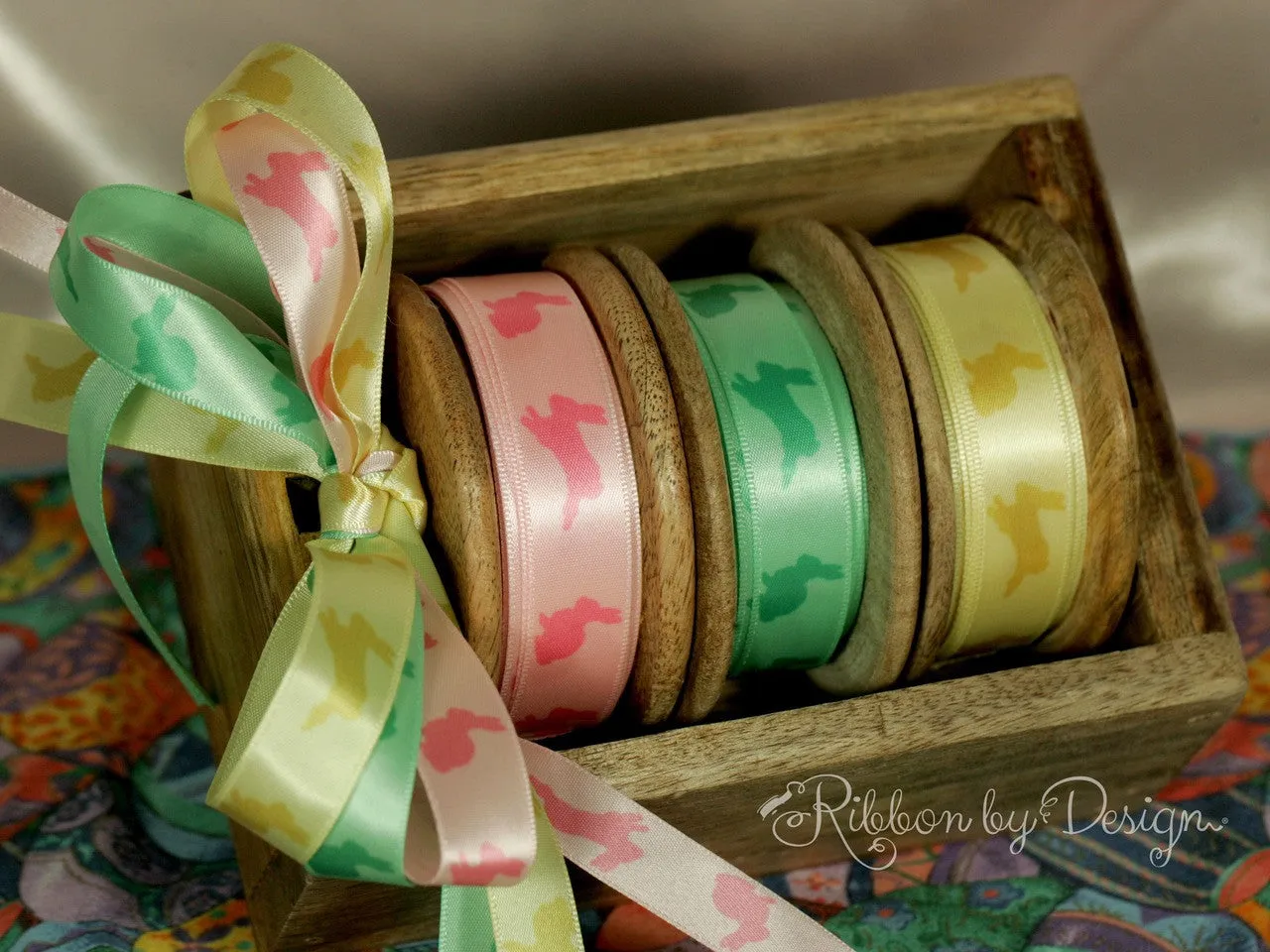 Bunnies Ribbon in pink hopping on 5/8"Lt. Pink single face satin ribbon